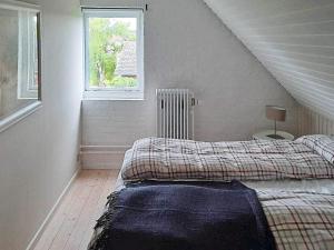 Holiday home Bindslev XVI客房内的一张或多张床位
