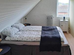 Holiday home Bindslev XVI客房内的一张或多张床位