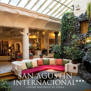 a couch sitting in the middle of a building at San Agustin Internacional in Cusco