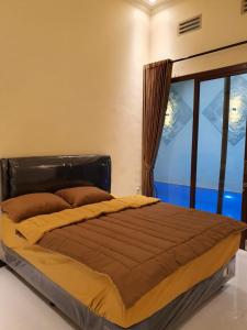Postelja oz. postelje v sobi nastanitve Villa Qta Batu (Private Pool)