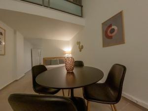 Posezení v ubytování SP Central Loft + 14 fotografií