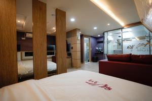 Mokpo Well hotel客房内的一张或多张床位