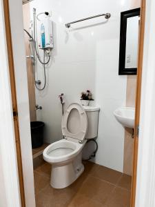 Koupelna v ubytování Cozy Millenium House
