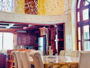 a dining room with a table and chairs at Beautiful house in Rocky Point in Puerto Peñasco