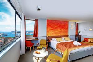 Posteľ alebo postele v izbe v ubytovaní Horizon Luxury Suites & Design Rooms