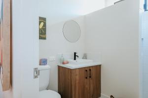 a bathroom with a sink and a toilet at Little Mary in Bremer Bay