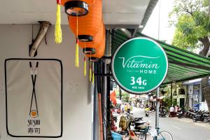 Un certificado, premio, letrero u otro documento en Vitamin Home Hoè Nhai