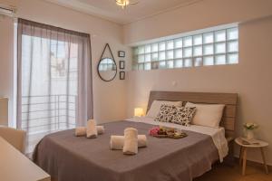 Posteľ alebo postele v izbe v ubytovaní Apartment in the Historical Center of Athens