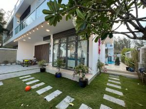 Zahrada ubytování Villa Zenna Long Hải_ view biển