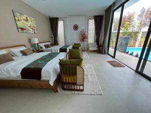 Postel nebo postele na pokoji v ubytování Villa Zenna Long Hải_ view biển + 47 fotografií
