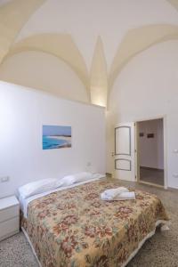 - une chambre avec un lit dans l'établissement Villa Pamela, à Barbarano