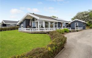 a house with a large yard in front of it at Lovely Home In Nordborg With Kitchen in Nordborg