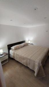 A bed or beds in a room at Casa Vacanze da Peppe