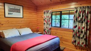 Postel nebo postele na pokoji v ubytování Central Chalets Ltd + 37 fotografií