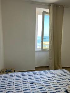 Postel nebo postele na pokoji v ubytování Stella di Mare- Cruise Shuttle