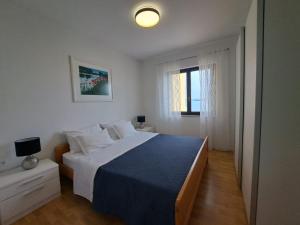 Postel nebo postele na pokoji v ubytování Villa Sirius