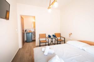 Łóżko lub łóżka w pokoju w obiekcie Casa la Scala