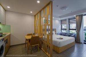 Billede fra billedgalleriet på HSuites Riverside Hotel and Apartment i Da Nang + 47 billeder