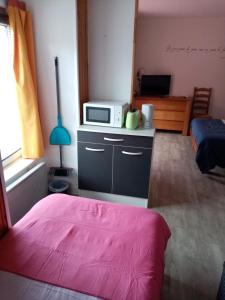 Postel nebo postele na pokoji v ubytování Cophi home Penguily