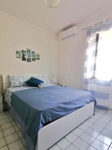Postel nebo postele na pokoji v ubytování B&B Orizzonte Blu