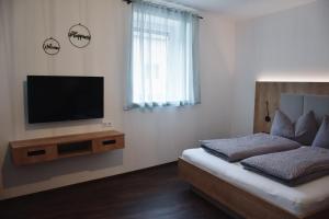 Postel nebo postele na pokoji v ubytování Das Joes Frühstückspension
