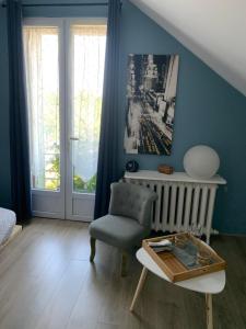 Posezení v ubytování Chambre cosy à Houilles
