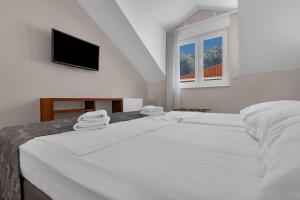 Postel nebo postele na pokoji v ubytování Brotis - Apartment with sea view - Makarska Exklusiv