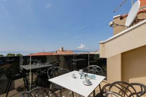 Balkón nebo terasa v ubytování Brotis - Apartment with sea view - Makarska Exklusiv