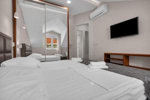 Postel nebo postele na pokoji v ubytování Brotis - Apartment with sea view - Makarska Exklusiv