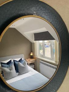 Voodi või voodid majutusasutuse Quarry Loft, Bowness on Windermere toas +6 fotot