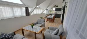 TV a/nebo společenská místnost v ubytování Babi Apartmanház