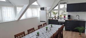 Kuchyň nebo kuchyňský kout v ubytování Babi Apartmanház