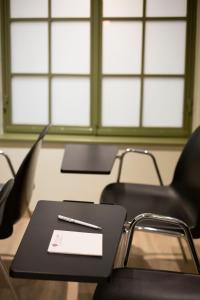 Área de negócios e/ou sala de conferências em Abc Hotel