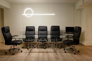 Área de negócios e/ou sala de conferências em Abc Hotel
