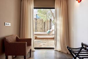 Zona d'estar a Villa Larosa with seaview in Es Cubells Ibiza