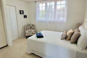 Ένα ή περισσότερα κρεβάτια σε δωμάτιο στο De Terrace