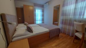 Postel nebo postele na pokoji v ubytování Guest house Tom