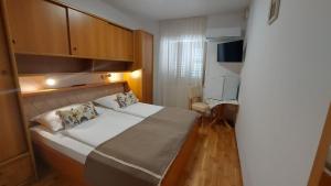 Postel nebo postele na pokoji v ubytování Guest house Tom