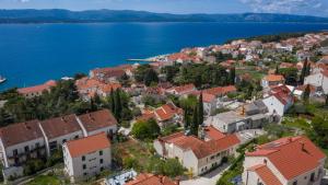 an aerial view of a town next to the water at SD House in Bol +9 photos