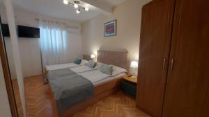 Postel nebo postele na pokoji v ubytování Guest house Tom