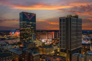 a city skyline with tall buildings at dusk at Residence Inn Atlanta Downtown in Atlanta