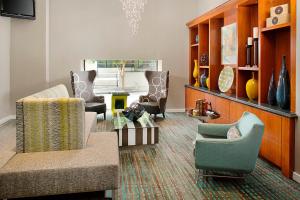 a living room with a couch and chairs and a table at Residence Inn Atlanta Downtown in Atlanta