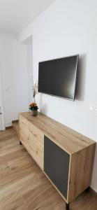 TV a/nebo společenská místnost v ubytování Vistas mar y montaña LasNegras