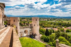 an old castle with a view of a city at CASA VACANZE Da Mario Lu Ciclista in Spello