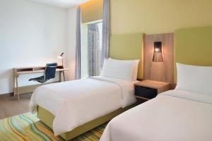 Element by Westin City Center Dohaにあるベッド