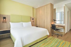 Element by Westin City Center Dohaにあるベッド