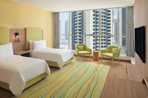 Element by Westin City Center Dohaにあるベッド