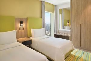 Element by Westin City Center Dohaにあるベッド