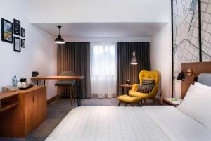 Postel nebo postele na pokoji v ubytování Le Meridien Abu Dhabi