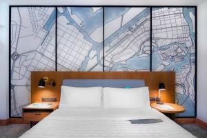 Postel nebo postele na pokoji v ubytování Le Meridien Abu Dhabi